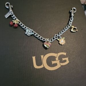 COACH bag charm with charms